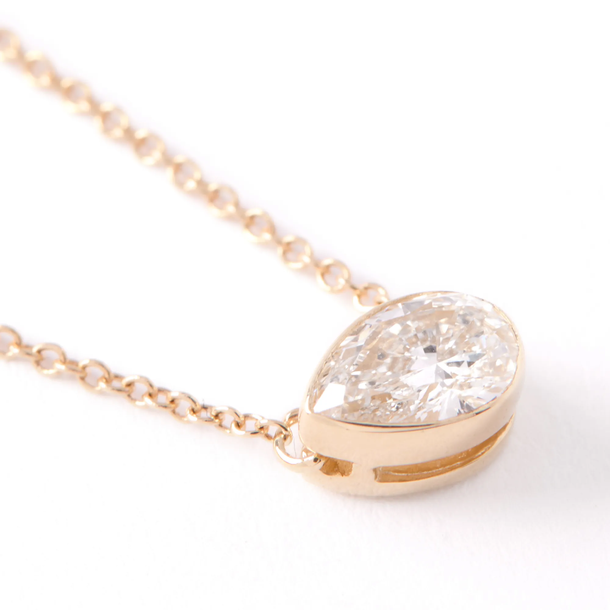 Pear Diamond Invisible Bezel Pendant, ½ Carat Total Weight, 14K Yellow Gold New
